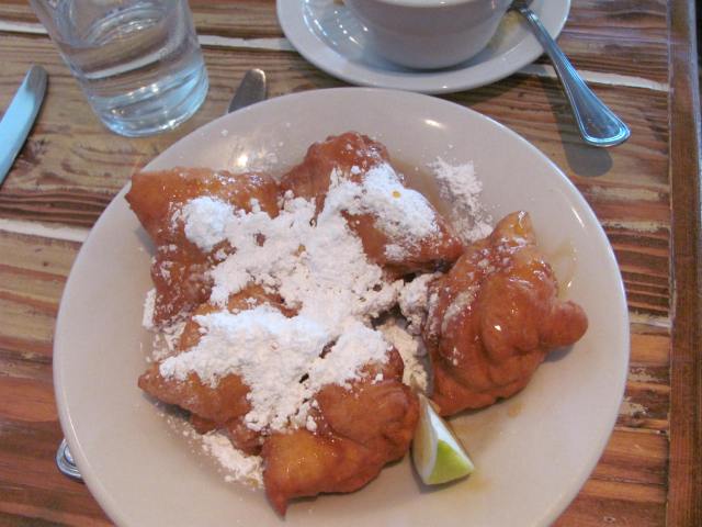 Beignets with honey and a touch of lemon.